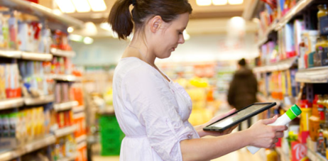 Data Driven Decision Making | Woman Using Tablet While Purchasing Groceries